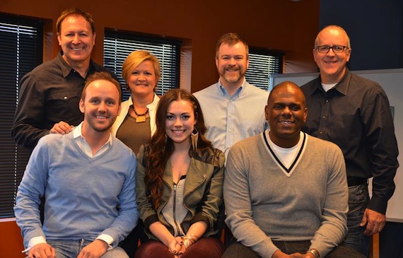 Pictured (Front row): Rusty Gaston (THiS), Weisband, Jon Platt (WCM). (Back row): Tim Nichols (THiS), Connie Harrington (THiS), Ben Vaughn (WCM), Phil May (WCM).