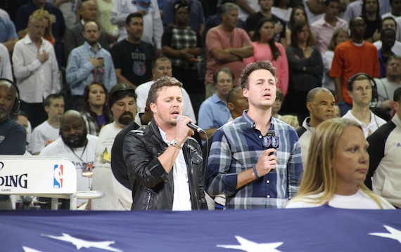 Love and Theft perform the national anthem.