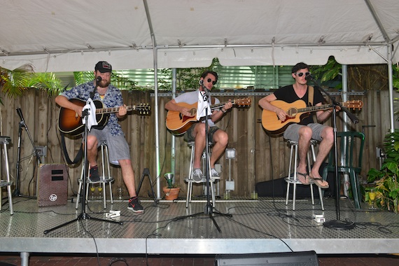 Songwriter Cary Barlowe (far left) performs with country duo John & Jacob.