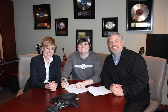 Pictured L-R: Celia Froehlig, Vice President of Black River Publishing; Forest Glen Whitehead; Gordon Kerr, CEO of Black River Entertainment