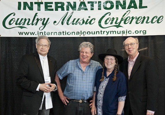  Pictured above, left to right, are conference co-host James Akenson, Si Kahn, Sue Massek and conference co-host Don Cusic.