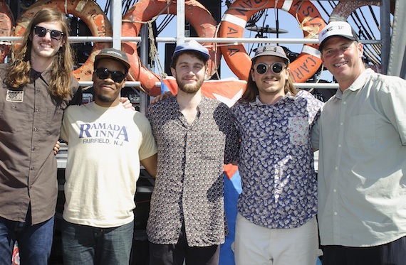 Nashvilles The Lonely Biscuits join BMI's Mark Mason backstage at the 2014 Hangout Music Festival.