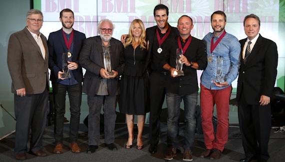 The nights big winners gather for a photo at the 2014 BMI Christian Awards in Nashville. Pictured are (l-r): BMI's Phil Graham, Song of the Year writer Scott Cash, Publisher of the Year Eddie DeGarmo of Capitol CMG Publishing, BMI's Leslie Roberts, Song of the Year writer Ed Cash, Songwriter of the Year and Song of the Year writer Chris Tomlin, Songwriter of the Year Brandon Heath, and BMI's Jody Williams. Photo by John Russell