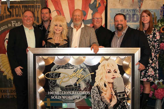 Pictured (L-R): Webster Public Relations' Kirt Webster, Guesty PR's Steve Guest, Dolly Parton, Glastonbury Owner Michael Eavis, CTK Management CEO Danny Nozell, and Sony Music's Faye Donaldson.