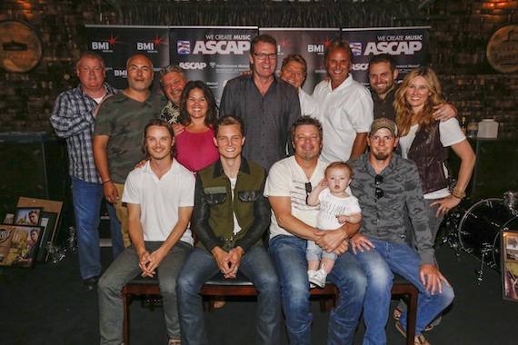 Pictured (Back row, L-R):  ASCAP Senior Creative Director Mike Sistad, Producer Marshall Altman, Big Loud Shirt Industries Owner Craig Wiseman, Big Yellow Dog Music Co-Owner/General Manager Carla Wallace, Warner Music Nashville Executive Vice President & General Manager Peter Strickland, BMI Director of Writer/Publisher Relations David Preston, Producer and Warner Music Nashville Senior Vice President of A&R Scott Hendricks, Big Loud Shirt Industries Vice President Seth England, Warner Music Nashville Vice President of A&R Cris Lacy. (Front row, L-R): Josh Kear, Frankie Ballard, Rodney Clawson with daughter Charlie Jo, Chris Tompkins Photo: Ed Rode