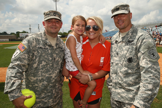 Jamie Lynn Spears poses with her daughter and military.  