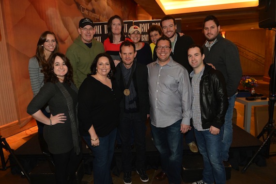 Verges and his UMPG team in 2013: Top row (L-R): Amanda Merki, Executive Assistant to Kent Earls, UMPG Nashville; Ron Stuve, VP of A&R/Special Projects, UMPG Nashville; Whitney Williams, Creative Director, UMPG Nashville; Missy Wilson, Senior Creative Director, UMPG; Tammy Helm, Manager of Administration, UMPG Nashville; Travis Gordon, Creative Manager, UMPG Nashville; Freeman Wizer, Creative Director, UMPG Nashville?Bottom row (L-R): Kendall Connell, Receptionist, UMPG Nashville; Cyndi Forman, Vice President, Creative, UMPG Nashville; Troy Verges; Kent Earls, Executive Vice President/General Manager, UMPG Nashville; John Mark Capers, Catalog and Studio Manager, UMPG Nashville