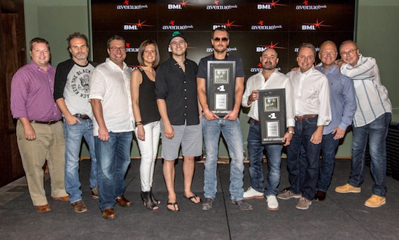 BMI hosted a celebration honoring Eric Church's most recent #1 hit single "Give Me Back My Hometown" amongst music industry VIPs at their Nashville office yesterday afternoon. Co-written by Church and Luke Laird, "Give Me Back My Hometown" is from Church's critically acclaimed fourth studio album, The Outsiders, which debuted at #1 on Billboard's Top 200 and Top Country Albums charts. The song is the fifteenth #1 hit for BMI's 2012 Songwriter of the Year Luke Laird, and the third #1 for Eric Church. Pictured (l-r): BMI's Bradley Collins, Q Prime's John Peets, Songs of Universal's Kent Earls, Creative Nation's Beth Laird, Luke Laird, Eric Church, Longer and Louder Music's Arturo Buenahora, BMI's Jody Williams, Sony / ATV Tree Publishing's Troy Tomlinson, Universal Music Group's Mike Dungan. Photo credit: Ed Rode