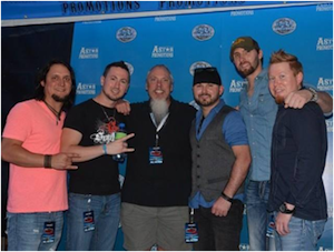 Pictured (L-R): Jason Paxton, Casey Joe Kelly, Sirius XMs senior director of country programming John Marks, Waylon Owings, Josh Coleman and Smiley Norris.  