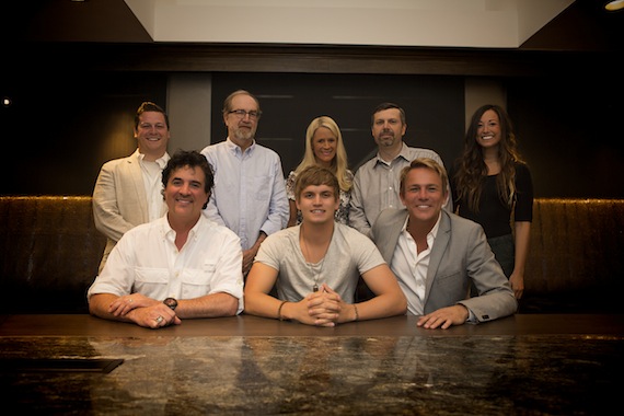 Pictured (L-R): Back Row  Iconic Entertainments Brian ONeil, BMLGs Malcolm Mimms, Allison Jones, Andrew Kautz & Iconic Entertainments Ally Rodriguez Front Row  BMLGs Scott Borchetta, Levi Hummon & Iconic Entertainments Fletcher Foster. Photo: Seth Hellman for The Valory Music Co.