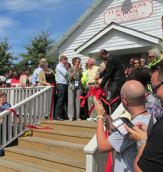 Ribbon Cutting Tina Turner-Flagg Grove School Dedication. Photo: Mary Bufwack.