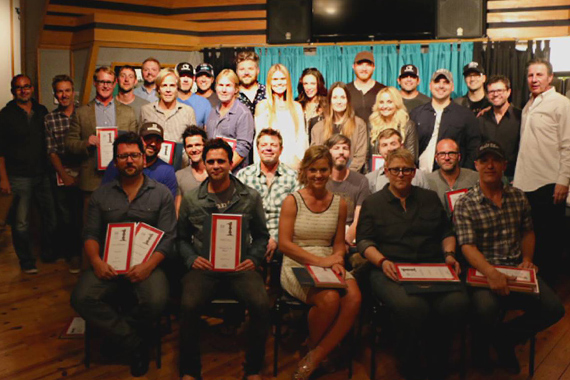 Pictured (L-R) first row seated: Chris DeStefano, Phillip LaRue, Katrina Elam, Bonnie, Baker, Jason Sellers. (2nd row seated): Dallas Davidson, Michael Carter, Rodney Clawson, Paul Jenkins, Jimmy Robbins, Andrew Dorff  (Standing): Derek George, Tommy Lee James, John Ozier, Ashley Gorley, Josh Osborne, Marv Green, Ben Hayslip, Shane Minor, Rob Crosby, Bryan Simpson, Nicolle Galyon, Rose Falcon, Natalie Hemby, Eric Paslay, Heather Morgan, Rhett Akins, Jon Nite, Luke Laird, NSAI President Lee Thomas Miller, NSAI Executive Director Bart Herbison