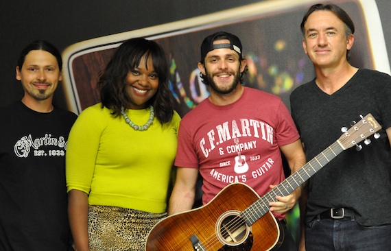 Pictured (L-R): Chris Thomas (Sr. Mgr. Artist Relations), Amani Duncan (VP Brand Marketing), Thomas Rhett and Fred Greene (Chief Product Officer) Photo Courtesy of Martin Guitar