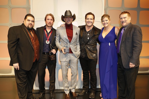 Pictured (L-R): SESACs Tim Fink, Song of the Year honoree Lance Miller, Tim McGraw, artist Jerrod Niemann and SESACs Shannan Hatch and John Mullins.