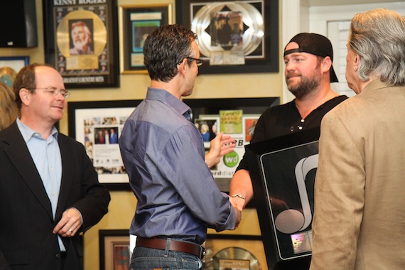 Pictured (L-R): Drew Alexander, David Israelite, Lee Brice, Mike Curb) Photo: NMPA/Bev Moser. 