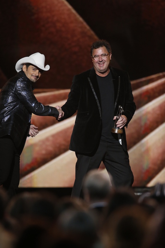 Brad Paisley presents Vince Gill with the Irving Waugh Award of Excellence during "The 48th Annual CMA Awards." Photo: John Russell / CMA