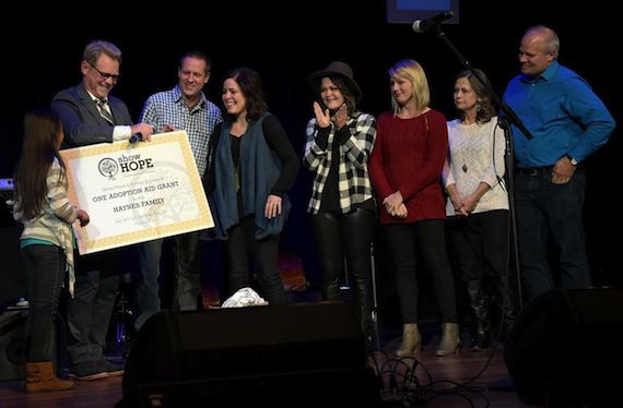 Steven Curtis Chapman presenting grant check to Mathew & Jill Haynes on behalf of Show Hope.  Photo: Rick Diamond/Getty Image