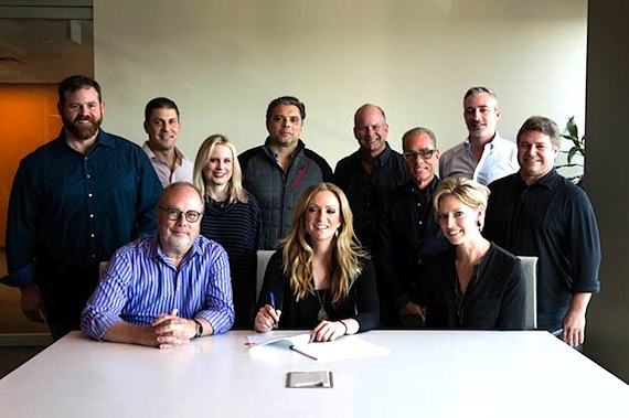 Front Row (L-R): UMG Nashville Chairman & CEO Mike Dungan, Clare Dunn, UMG Nashville A&R Sr. Director Stephanie Wright. Back Row (L-R): UMG Nashville SVP Promotion Royce Risser, UMG Nashville Vice President Business and Legal Affairs Rob Femia, UMG Nashville President Cindy Mabe, Red Light Managements Shawn McSpadden, WMEs Kevin Neal, Greenberg Traurig LLPs Jess Rosen, UMG Nashville Senior Vice President A&R Brian Wright, UMG Nashville Senior Vice President/COO Tom Becci. Photo: Mary Caroline Russell