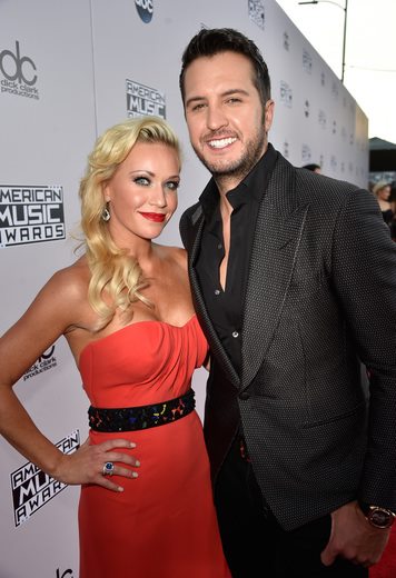 Caroline and Luke Bryan on the AMA red carpet. Photo: AMA