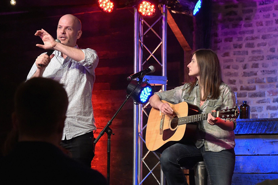 YouTube personality Todd Womack (L) introduces a performance from Erin Enderlin (R). Photo: Rick Diamond