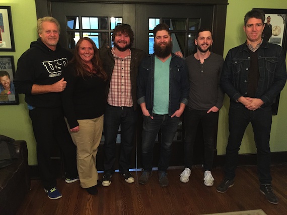 Pictured L-R: Chris Farren (Combustion Music owner/President); Sara Walters (Loeb & Loeb), Chris Van Belkom (Combustion Music VP); Luke Foley; Kenley Flynn (Combustion Music Creative Director); and John Strohm (Loeb & Loeb).