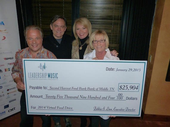 (L-R): LM Gift of Service Chair Stacy Widelitz, LM President-Elect Mike Craft, LM President Diane Pearson and Day. 