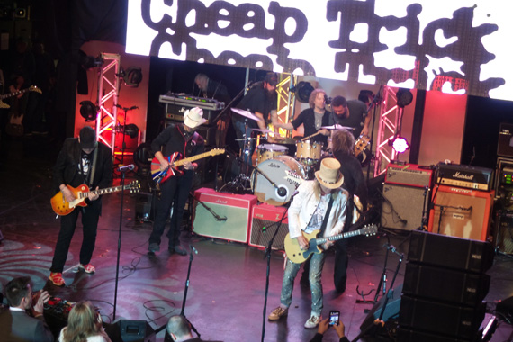 Brad Paisley performs with the nights show-closing special surprise guest, Cheap Trick.