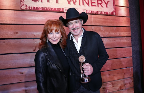 Reba (l) presents Kix Brooks with the CMA Foundation Humanitarian Award Monday at City Winery in Nashville. Photo Credit: Donn Jones / CMA