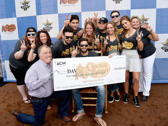 Rhett's team included Rhett Akins, Danielle Bradbery, Dan + Shay (Dan Smyers and Shay Mooney), Scotty McCreery, Cassadee Pope, and Rhett's wife Lauren Rhett, along with former DAV National Commander Bobby Barrera and four contest winners. Also in the photo is Cracker Barrel Old Country Store Senior Vice President of Marketing Chris Ciavarra. Photo: Getty Images