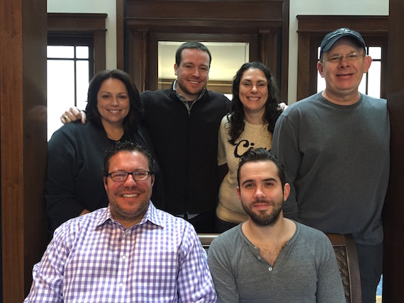 (Pictured, Back Row):  Cyndi Forman, UMPG VP, Creative; Travis Gordon, UMPG Creative Director; Missy Wilson, UMPG Sr. Creative Director; and Ron Stuve, UMPG VP A&R. (Front Row):  Kent Earls, EVP/GM, UMPG; and Sam Ellis. 