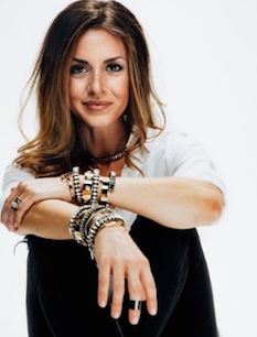 Shelly Brown wearing designs from her jewelry collection.