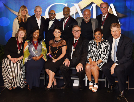 Pictured (L-R, back row): Shelley and Louie Giglio, Bishop Paul S. Morton, BeBe Winans, Al Andrews, Roland Lundy, Twila Paris, CeCe Winans, Candy Christmas, Mark Lowry, Jackie Patillo and John Huie. Photo: Getty Images