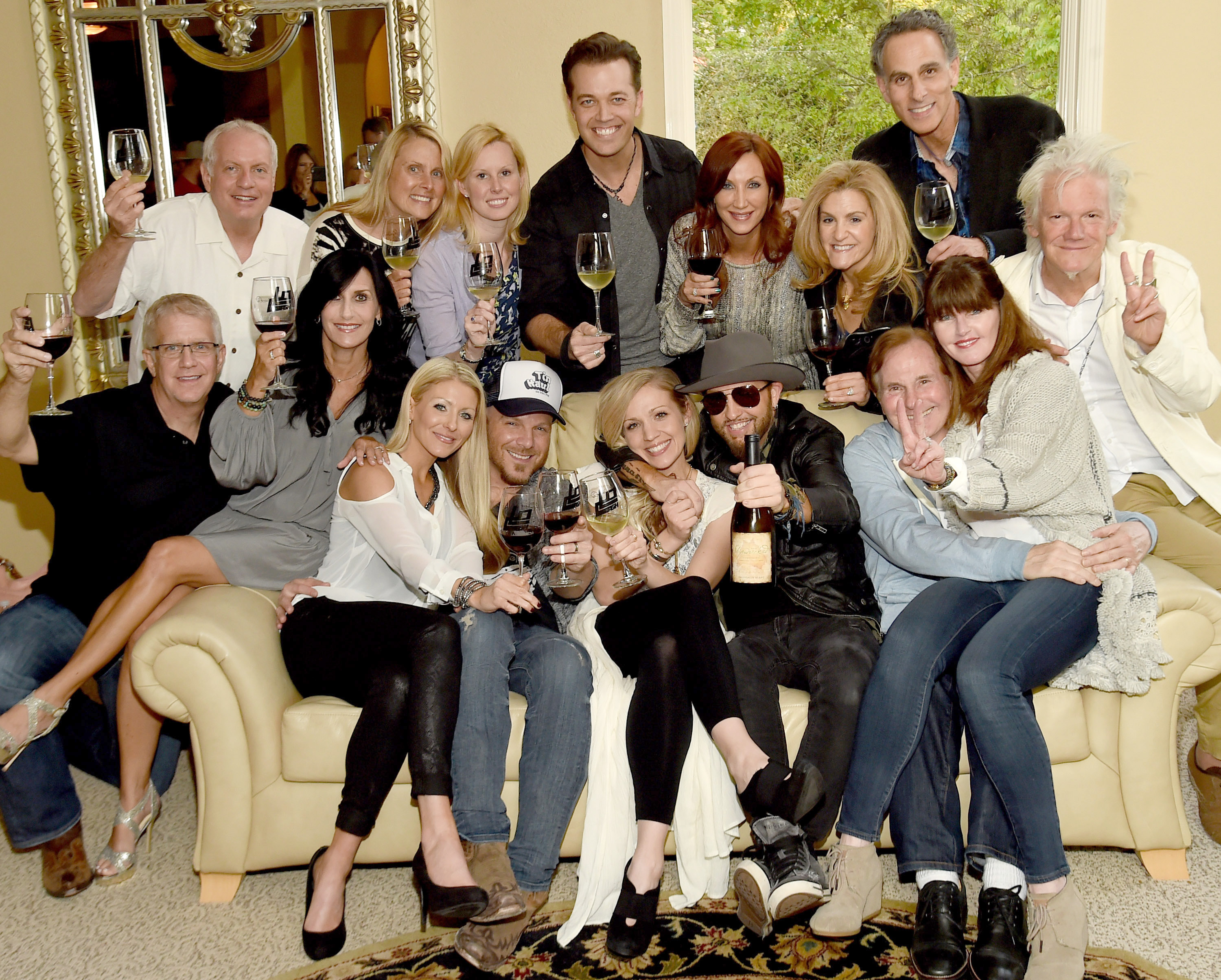 Pictured (L-R), Lower front row: Kaitlyn Lucas, Chris Lucas (LOCASH), Kristen White, Preston Brust (LOCASH), Butch Waugh, Belinda Waugh, Skip Bishop. Middle: Jon Ozor (Stonum Vineyards), Rhonda Ozor Top row Ken Little, Julie Little, Kelly Ziegenfuss (Reviver), Lucas Hoge (Reviver artist), Laura Lynn, Jennifer Ross, David Ross (Reviver).