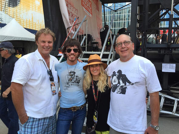 Pictured: (L-R): Warner Music Nashville EVP of A&R Scott Hendricks; Janson; WMN VP of A&R Cris Lacy and WMN president & CEO John Esposito