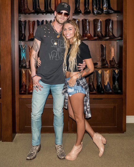 Florida Georgia Lines Brian Kelley and wife, Brittney Kelley, presented their "bohemian chic" Tribe Kelley collection of clothes and accessories Thursday at a pop-up shop inside the Lucchese Bootmaker store in Nashvilles trendy Gulch neighborhood.    Tyler Hubbard, the other half of the Florida Georgia Line super-duo, showed his support by attending the lively event with fianc Hayley Stommel.   Brian wore never-before-seen pieces he designed from the upcoming Tribe Kelley mens collection, out later this month, and handmade Lucchese eastern diamond rattle snake boots. Brittney wore her Tribe Kelley designs with handmade Lucchese sable python booties. Photo:  Ed Rode