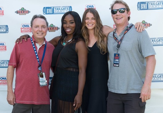 BMIs Jody Williams and Clay Bradley pose with BMI singer/songwriters Kallie North and Jessy Wilson of Muddy Magnolias backstage at the BMI Tailgate party. 