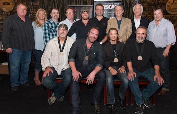 Pictured Back Row (L-R): ASCAPs Mike Sistad, Big Yellow Dogs Danni ONeill, Amylases Ben Vaughn and Whit Jeffords, producers Kyle Jacobs and Matt McClure, Curb Records Mike Curb and Jim Ed Norman, BMIs Bradley Collins. Front Row: BMI songwriter David Frasier, BMI singer/songwriter Lee Brice, songwriter Josh Kear, BMI songwriter Ed Hill