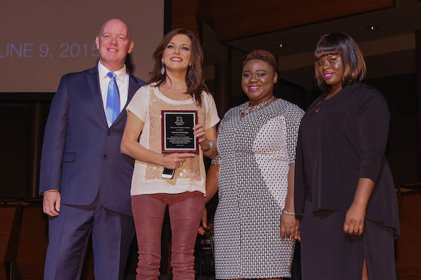 Pictured (L-R): Covenant House President Kevin Ryan, Martina McBride and two residents of Covenant House