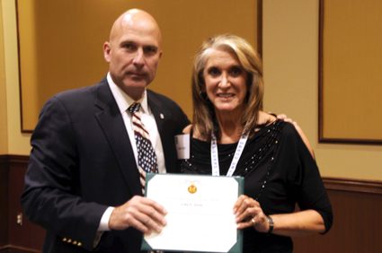 Pictured Below (L to R): Lieutenant General Joseph Anderson (United States Army),  and founder of Stars for Stripes, Judy Seale 