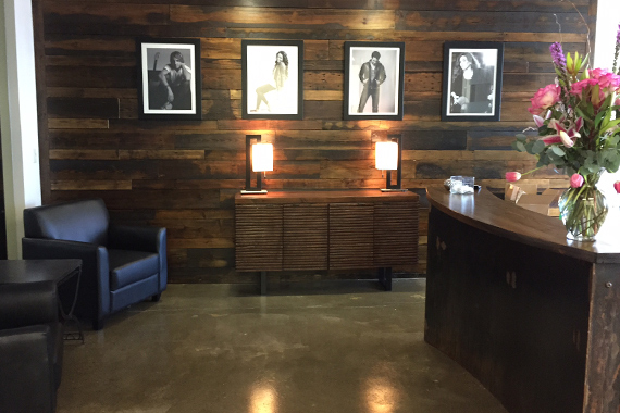 Borman's remodeled reception area, featuring reclaimed wood.