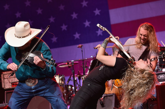 Charlie Daniels and Natalie Stovall trade licks at the Volunteer Jam 