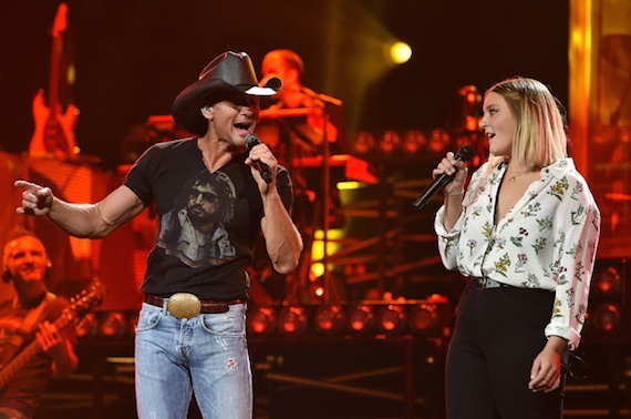 Tim McGraw performs with daughter Gracie.