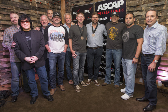 Celebrating Jason Aldeans No. 1 hit Tonight Looks Good On You. (L-R): Warner Chappells Ben Vaugh, ASCAPs John Titta, BBR Music Groups Benny Brown, SONY/ATVs Tom Luteran, BMI songwriter Rhett Akins, Combustion Musics Chris Farren, songwriter Ashley Gorley, BMI songwriter Dallas Davidson, BMI affiliate Jason Aldean producer Michael Knox and BMIs Jody Williams.