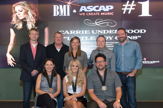 (L-R) (back row): BMGs Kos Weaver, ASCAPs Mike Sistad, Aristas Lesly Tyson, BMIs Jody Williams, Sony ATVs Josh Van Valkenburg. (Front row): ASCAP songwriter Hillary Lindsey, BMI singer-songwriter Carrie Underwood and ASCAP songwriter Chris DeStefano.