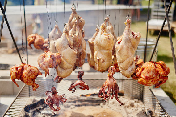 Andrew Zimmern's BBQ near Martin's BBQ daytime setup. 