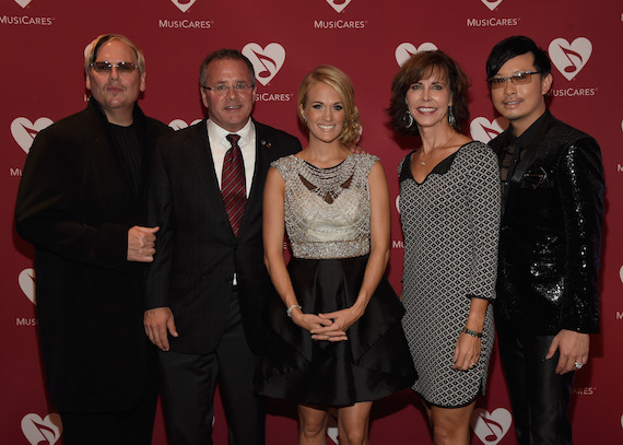 Pictured (L-R): Johnathon Arndt;  Pete Fisher, Vice President/General Manger Grand Ole Opry and MusiCares Board member; seven-time GRAMMY winner Carrie Underwood; Debbie Carroll, Senior Executive Director MusiCares; Newman Arndt. Photo: Rick Diamond/The Recording Academy