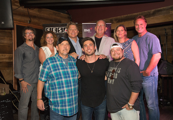 Pictured: (L-R): (Back Row) Parallels Tim Hunze, Magic Mustangs Juli Newton-Griffith, BMIs David Preston, Warner Music Groups John Esposito, SESACs Shannan Hatch, producer Scott Hendricks. (Front Row) BMI songwriter Michael White, BMI affiliate Michael Ray and songwriter Justin Wilson. (photo by Steve Lowry)