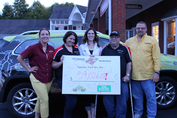 Thunder 102 staffers celebrate Country Cares for St. Jude Kids Radiothon.