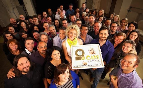 Cam celebrates her Gold record for Burning House with members of her team and the Sony Music Nashville staff.