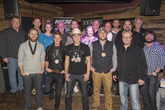 Pictured (L-R) Front: Co-writer Zach Crowell, Co-writer Adam Sanders, Dustin Lynch, Co-writer Jaron Boyer and Producer Mickey Jack Cones. Back: ASCAP's Mike Sistad, Tape Room Music's Ashley Gorley, ASCAP's Beth Brinker, BBR's Benny Brown, peermusic's Michael Knox and Kim Wiggins, Big Yellow Dog's Kerry O'Neil, BBR's Jon Loba, Warner Chappell's Ryan Beuschel, SESAC's Tim Fink, and Combustion's Chris Farren, and Chris Van Belkom. Photo: Ed Rode